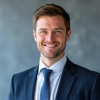 Audriaus Petraičio, generalinio direktoriaus, portretas, atspindintis patirtį ir pasitikėjimą.